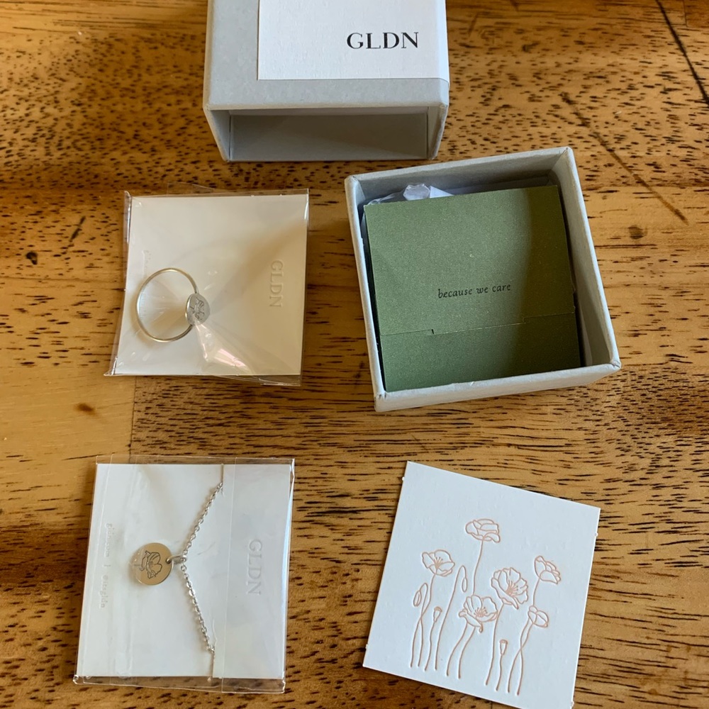 GLDN poppy flower necklace and ring. Sterling silver